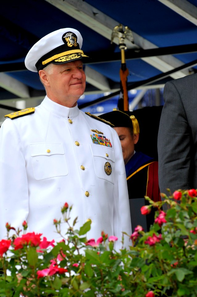 US Navy 100528-N-8273J-162 Chief of Naval Operations (CNO) Adm. Gary Roughead congratulates newly commissioned Navy ensigns and Marine Corps 2nd lieutenants during the U.S. Naval Academy Class of 2010 graduation and commissioni
