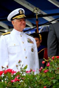 US Navy 100528-N-8273J-162 Chief of Naval Operations (CNO) Adm. Gary Roughead congratulates newly commissioned Navy ensigns and Marine Corps 2nd lieutenants during the U.S. Naval Academy Class of 2010 graduation and commissioni