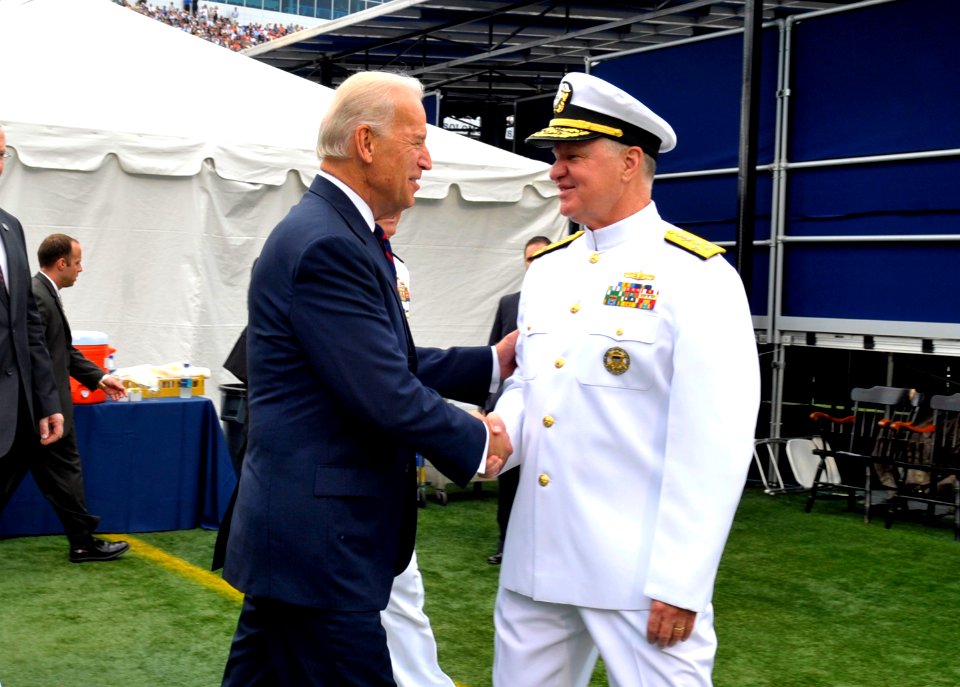 US Navy 100528-N-8273J-024 Chief of Naval Operations (CNO) Adm. Gary Roughead, right, greets Vice President Joe Biden at the U.S. Naval Academy class of 2010 graduation and commissioning ceremony at Navy-Marine Corps Memorial S