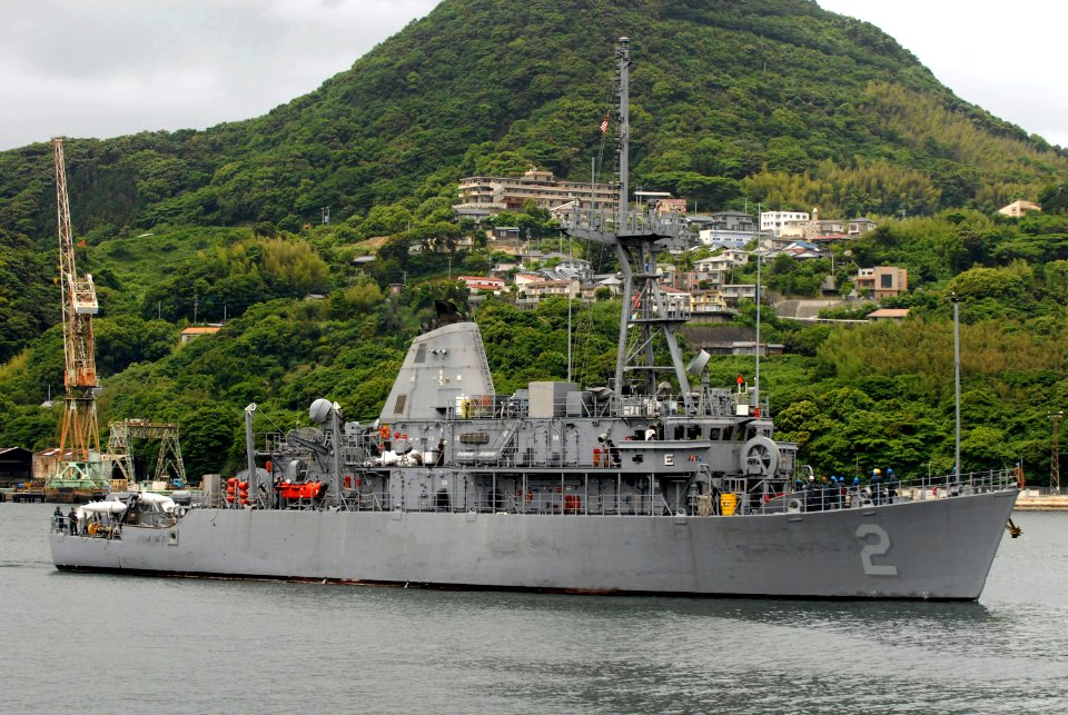 US Navy 100527-N-8335D-227 The Mine countermeasures ship USS Defender (MCM 2) pulls into its forward-deployed operating base in Sasebo, Japan