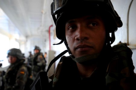 US Navy 100527-N-3136P-139 A Spanish navy visit, board, search and seizure team awaits their transportation after inspection aboard the Military Sealift Command container and roll-on-roll-off ship USNS LCPL Roy M. Wheat (T-AK 3