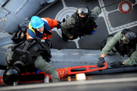 US Navy 100527-N-3136P-583 Portuguese navy visit, board, search and seizure team members climb down a ladder