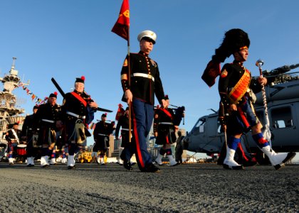 US Navy 100530-N-1831S-080 The Leatherneck Pipes and Drums practice before a Sunset Parade on the flight deck of USS Iwo Jima (LHD 7)