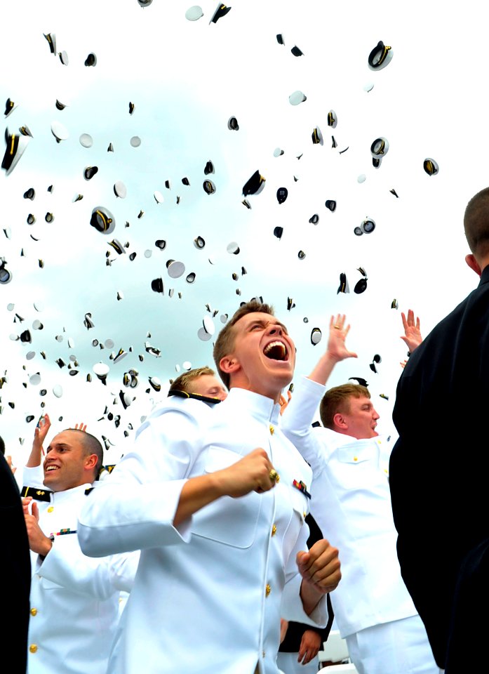 US Navy 100528-N-8273J-356 Newly commissioned officers from the U.S. Naval Academy Class of 2010 celebrate the conclusion of their graduation and commissioning ceremony with the traditional hat toss at Navy-Marine Corps Memoria