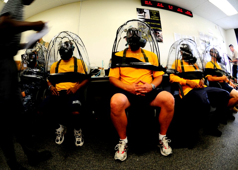 US Navy 100527-N-8607R-027 ndividual augmentee Sailors test their gas masks for leaks at Expeditionary Combat Readiness Center San Diego