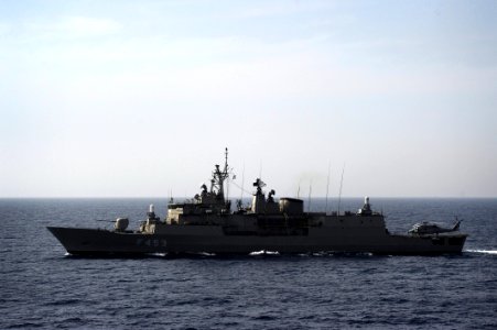 US Navy 100528-N-3136P-212 The Greek navy frigate HS Spetsai (F-453) transits alongside the Military Sealift Command container and roll-on-roll-off ship USNS LCPL Roy M. Wheat (T-AK 3016)