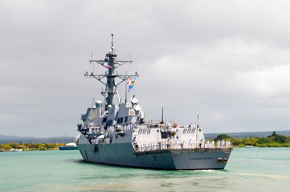 US Navy 100601-N-6674H-009 Sailors assigned to USS Chung-Hoon (DDG 93) man the rails as the ship departs on a western Pacific deployment