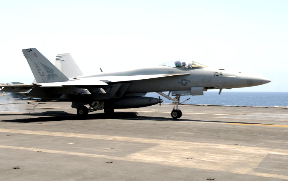US Navy 100530-N-4236E-404 An F-A-18E Super Hornet catches the arresting cable aboard USS Dwight D. Eisenhower (CVN 69)