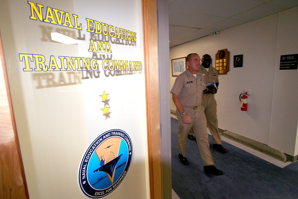 US Navy 100603-N-4482V-001 Senior enlisted leaders make their way to meet with Rear Adm. Joseph Kilkenny, commander of Naval Education and Training Command