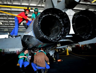 US Navy 100604-N-6003P-169 A French navy maintenance team, assigned to Rafale squadron 12F, conducts an engine swap-out aboard the Nimitz-class aircraft carrier USS Harry S. Truman (CVN 75)