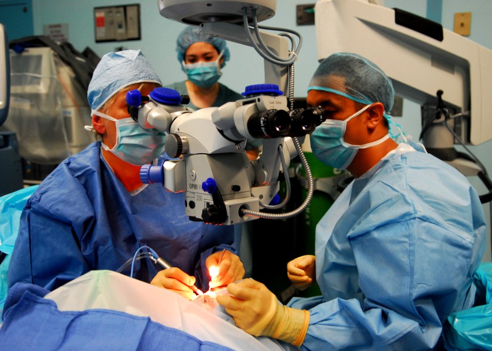 US Navy 100604-N-4044H-022 Doctors perform cataract surgery on a Vietnamese patient aboard Mercy