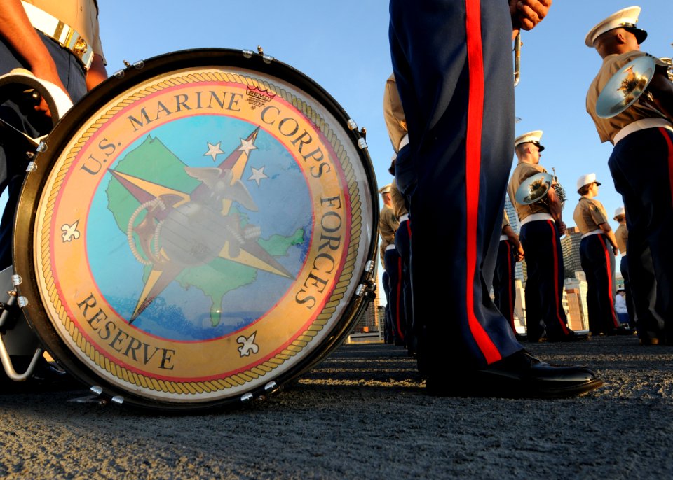 US Navy 100530-N-1831S-186 The U.S. Marine Corps Reserve Forces Band from New Orleans stands at attention during a Sunset Parade on the flight deck of USS Iwo Jima (LHD 7)