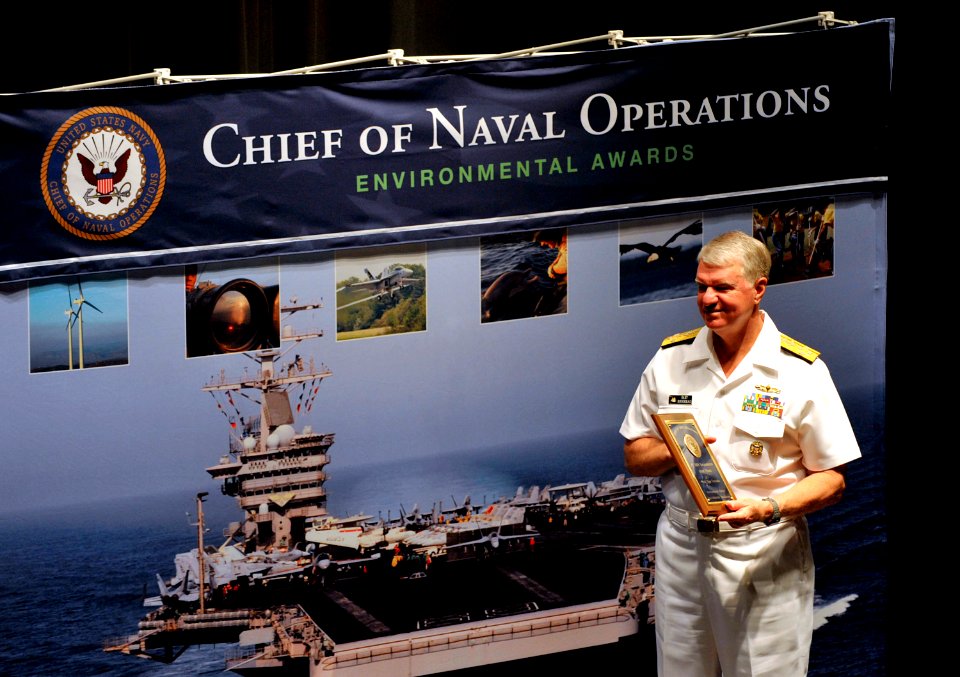 US Navy 100601-N-8273J-037 Chief of Naval Operations (CNO) Adm. Gary Roughead presents awards to 25 recipients of the Fiscal Year 2009 Chief of Naval Operations Environmental Awards during a ceremony at the Navy Memorial in Was