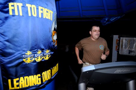 US Navy 100529-N-3283P-032 Master Chief Operations Specialist Michael Bauman, assigned to Commander, U.S. Naval Forces Japan,