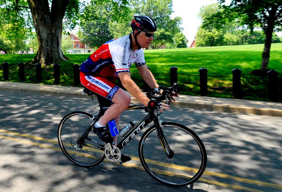 US Navy 100531-N-8273J-110 Chief of Naval Operations (CNO) Adm. Gary Roughead rides with more than 200 injured veterans
