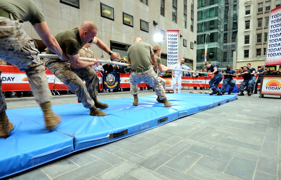 US Navy 100529-N-6676S-055 Sailors, right, pull Marines across a boundary line to win a tug-of-war contest live on the NBC Today Show