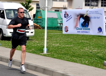 US Navy 100605-N-6692A-003 Lt. Karl Roystun participates in the Clear Vision 5-kilometer run