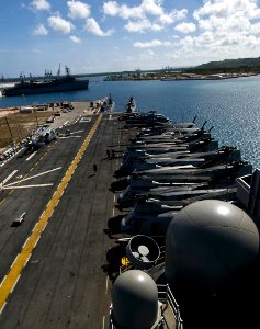 US Navy 100605-N-7948R-183 he amphibious assault ship USS Peleliu (LHA 5) is moored pierside at Naval Base Guam for a scheduled port visit