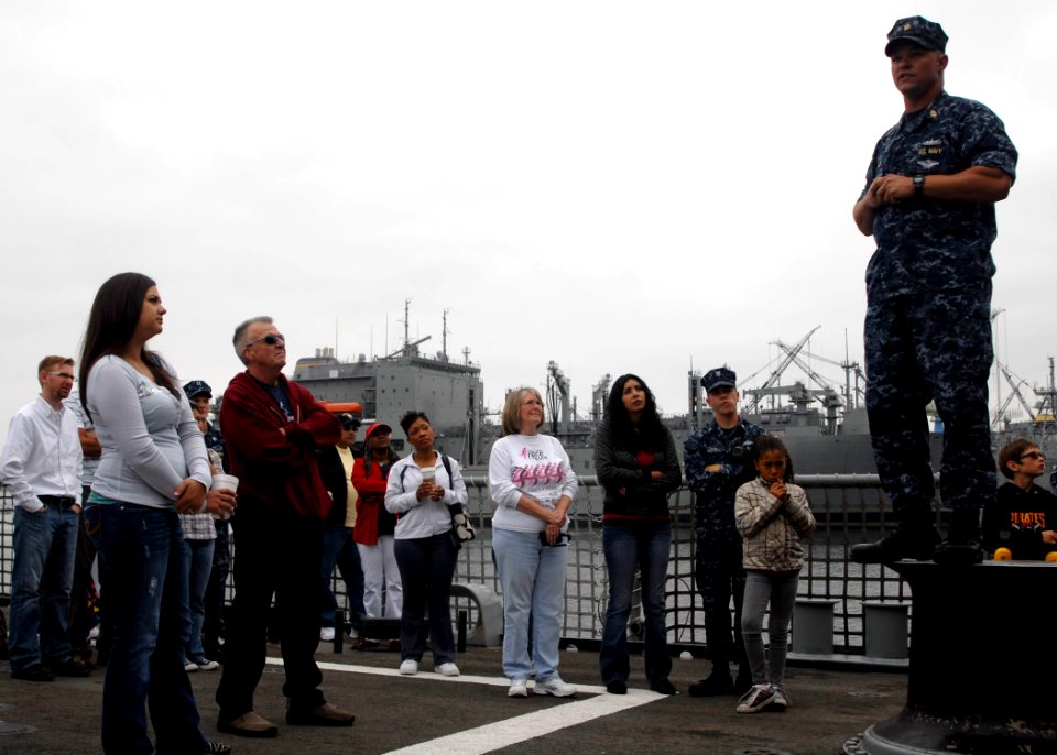 US Navy 100601-N-7058E-027 Chief Damage Controlman Craig Cole welcomes family members aboard USS Freedom (LCS 1)