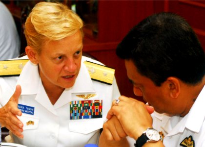 US Navy 100607-N-0995C-079 Rear Adm. Nora Tyson, commander of Task Force 73, talks with Vice Adm. Jamil Osman, Royal Malaysian Navy Joint Forces Commander, at the Cooperation Afloat Readiness and Training (CARAT) Malaysia 2010