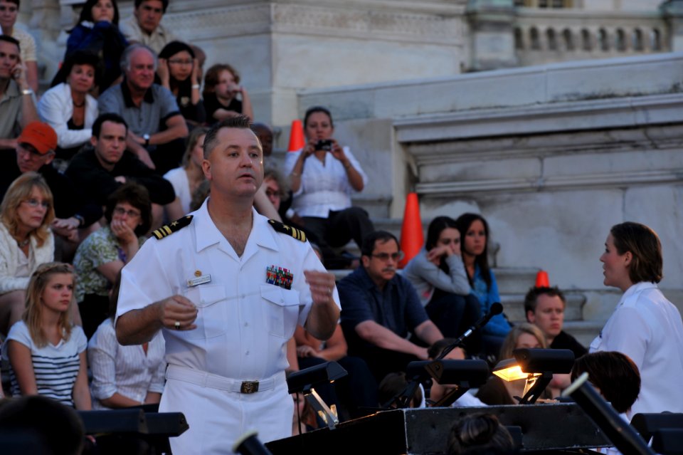 US Navy 100607-N-0773H-063 Lt. Cmdr. Brian O. Walden, commanding officer of the U.S. Navy Band, conducts the Concert Band during an evening concert at the U.S. Capitol