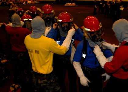 US Navy 100607-N-3620B-010 Sailors prepare to fight a simulated fire during a general quarters drill aboard USS Enterprise (CVN 65).