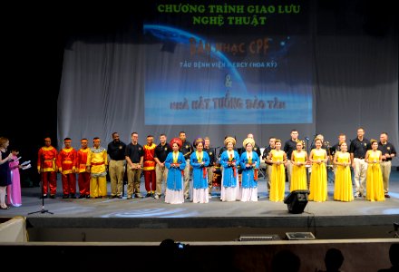 US Navy 100605-N-6410J-029 U.S. Pacific Fleet Band members and Vietnamese performing artists are introduced to audience members during a concert at the Quang Trung Hall