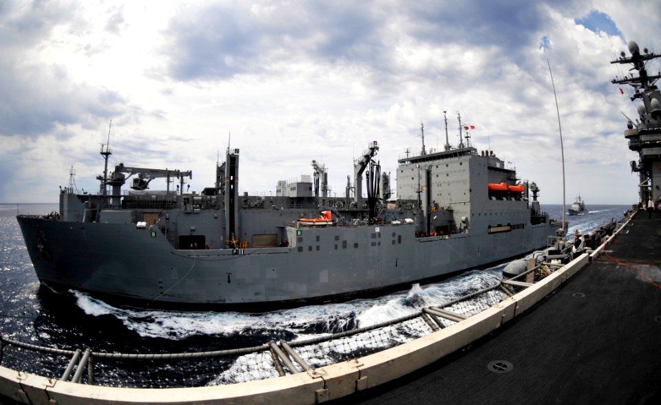 US Navy 100603-N-6003P-115 The Military Sealift Command dry cargo and ammunition ship USNS Sacagawea (T-AKE 2) pulls alongside the Nimitz-class aircraft carrier USS Harry S. Truman (CVN 75) to perform a replenishment at sea
