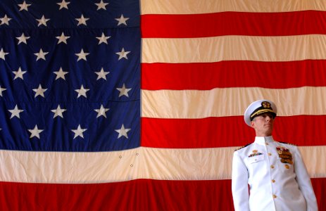 US Navy 100604-N-0535P-110 Capt. Aaron Cudnohufsky stands at attention during his change of command ceremony at Pacific Missile Range Facility where he turned over command to Capt. Nicholas Mongillo