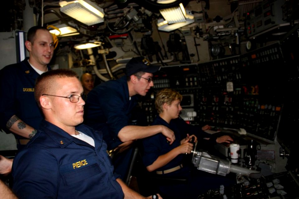 US Navy 100603-N-0000X-053 Midshipmen learn to pilot the submarine by training in the duties of the helm and planesman while underway aboard the Ohio-class ballistic-missile submarine USS West Virginia (SSBN 736)