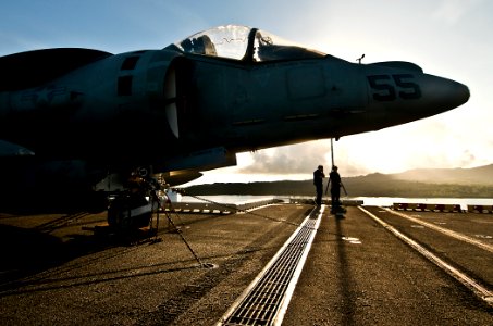 US Navy 100605-N-7948R-105 Sailors stand watch on the flight deck of the amphibious assault ship USS Peleliu (LHA 5) as it pulls into Guam for a scheduled port visit. T