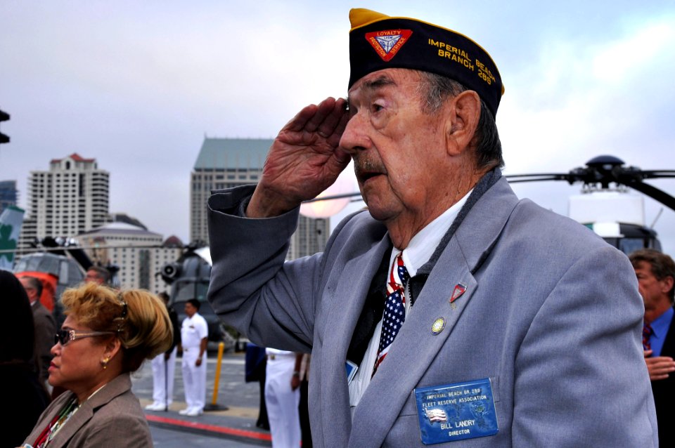US Navy 100605-N-3038W-077 Bill Landry salutes while the national anthem plays during a Battle of Midway commemoration ceremony aboard the USS Midway (CV 41) Museum