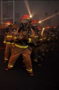 US Navy 100607-N-4516G-046 Sailors fight a simulated fire during a general quarters drill aboard USS Enterprise (CVN 65)