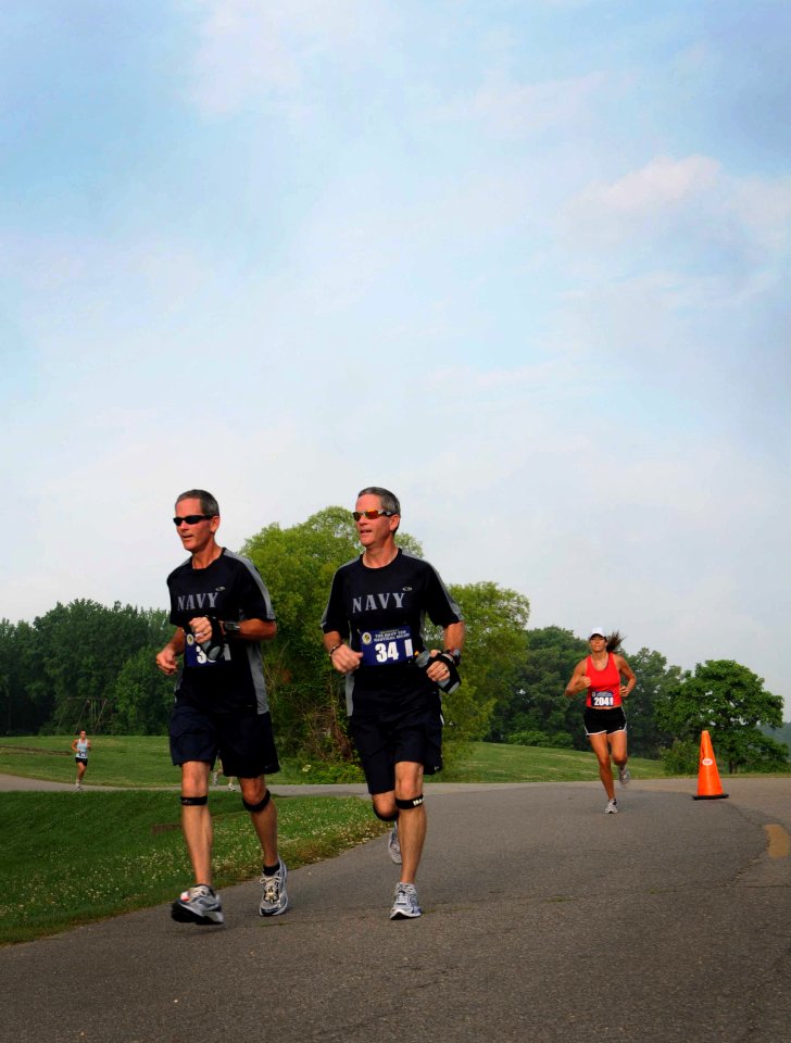 US Navy 100606-N-6046S-104 Runners participate in the inaugural Navy Ten Nautical Miler road race at Naval Support Activity Mid-South in Millington, Tenn
