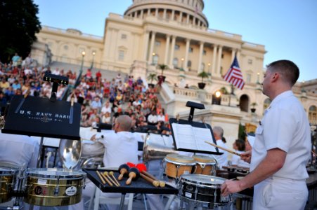 US Navy 100607-N-0773H-041 Musician 1st Class Christopher Dechiara performs on snare drum with the U.S. Navy Concert Band