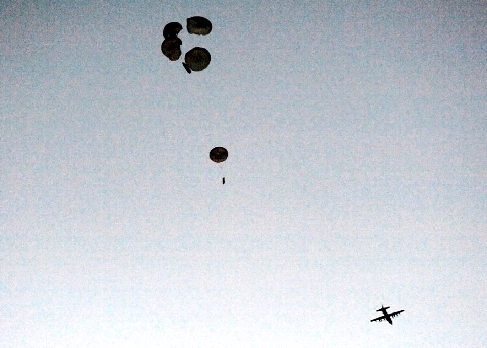 US Navy 100608-N-8689C-007 A Naval Special Warfare 11-meter rigid-hull inflatable boat parachutes near Ft. Walton Beach during a maritime craft aerial deployment system exercise