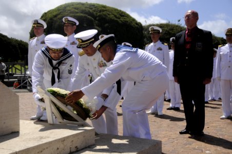 US Navy 100609-N-7498L-193 Japan Maritime Self-Defense Force Rear Adm. Tomohisa Takei lays a wreath at the National Memorial Cemetery of the Pacific at the Puowaina Crater photo