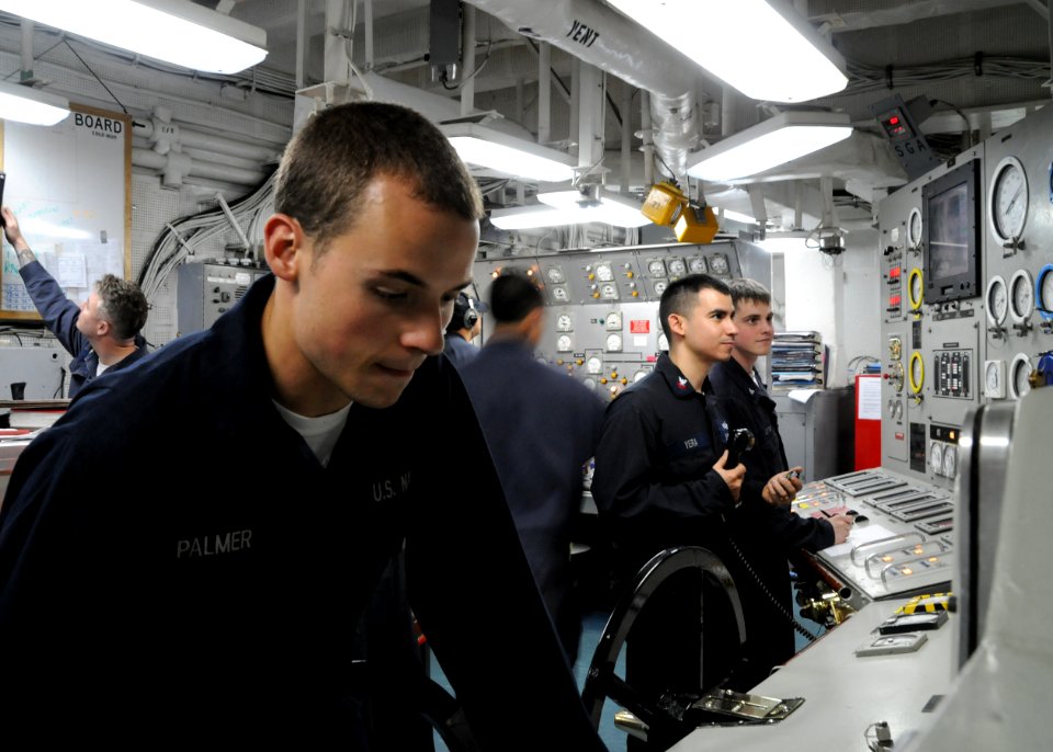US Navy 100608-N-0120A-010 Machinery Repairman Fireman James Palmer Machinist's Mate 2nd Class Marsell Yeracarballo and Machinist's Mate 3rd Class Dustin Cotner conducts a boiler flex evolution