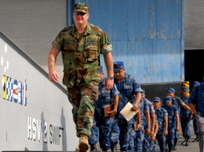 US Navy 100607-N-4971L-018 Senior Chief Gunner's Mate Edward Middendorf, from Staten Island, N.Y., leads members of Nicaragua defense forces aboard the High Speed Vessel Swift (HSV 2) photo