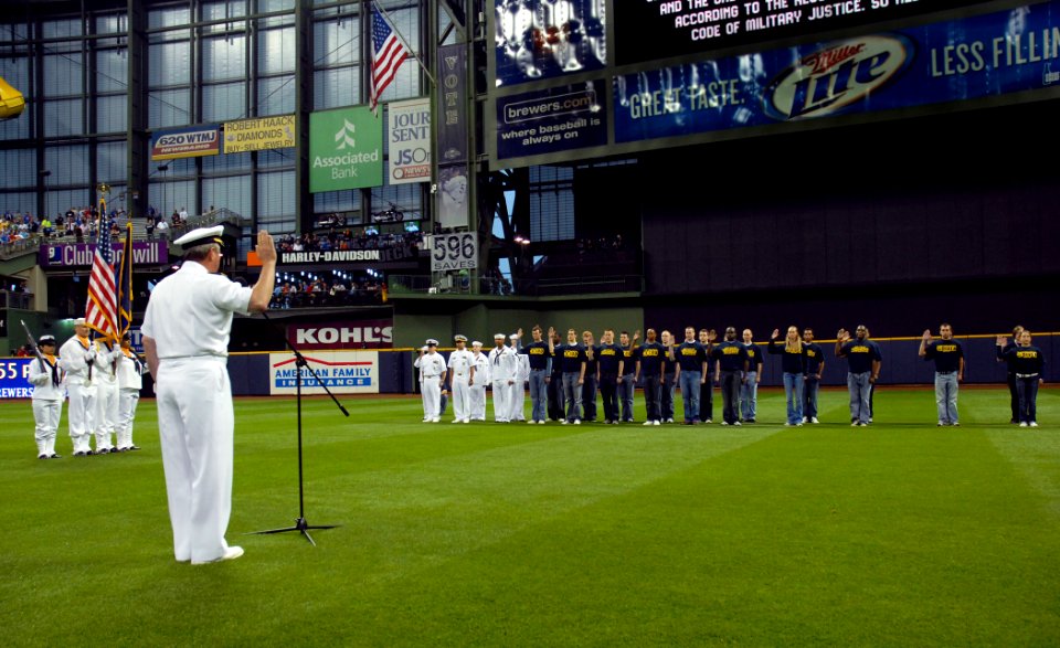 US Navy 100608-N-5208T-005 Rear Adm. Gerald R. Beaman delivers the oath of enlistment to future Sailors at a Milwaukee Brewers baseball game during Milwaukee Navy Week 2010