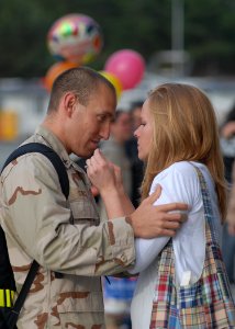 US Navy 100607-N-9520G-004 Aviation Electronic Technician 2nd Class John Corcel is welcomed by his wife during a homecoming at Naval Air Station Whidbey Island photo