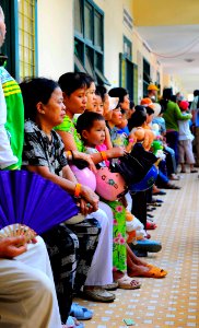 US Navy 100609-N-6410J-159 Vietnamese citizens queue for optometry services at the Hai Cang medical clinic during a medical community service project