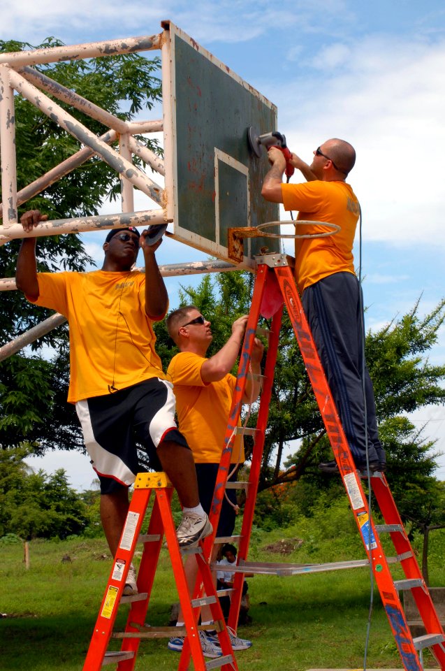 US Navy 100610-N-4971L-154 Sailors deployed aboard Swift (HSV 2) sand a basketball goal during a community service project in Corinto, Nicaragua