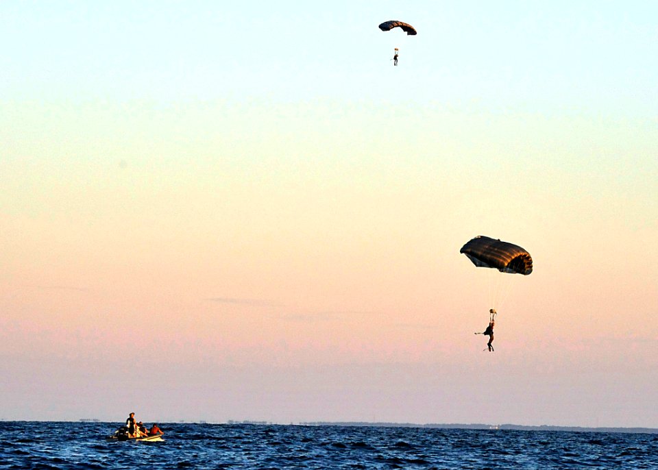 US Navy 100608-N-8689C-177 Navy SEALs and special warfare combatant-craft crewmen parachute during a maritime craft aerial deployment system exercise off the coast of Fort Walton Beach Florida