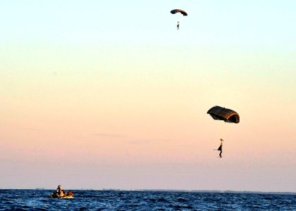 US Navy 100608-N-8689C-177 Navy SEALs and special warfare combatant-craft crewmen parachute during a maritime craft aerial deployment system exercise off the coast of Fort Walton Beach Florida