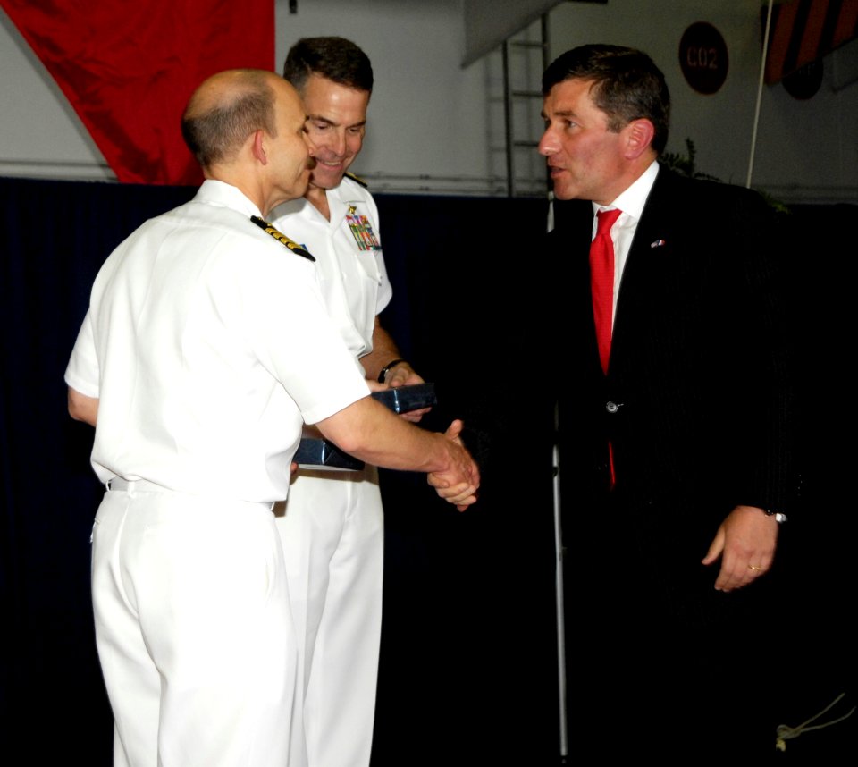 US Navy 100609-N-6362C-418 Rear Adm. Patrick Driscoll, center, commander of Strike Group 10, and Capt. Joseph Clarkson, commanding officer of the aircraft carrier USS Harry S. Truman (CVN 75)