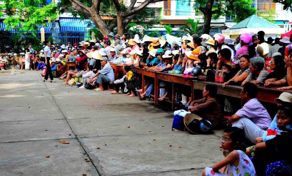 US Navy 100609-N-6410J-009 Vietnamese citizens queue for medical treatment at the Hai Cang medical clinic during a medical community service project