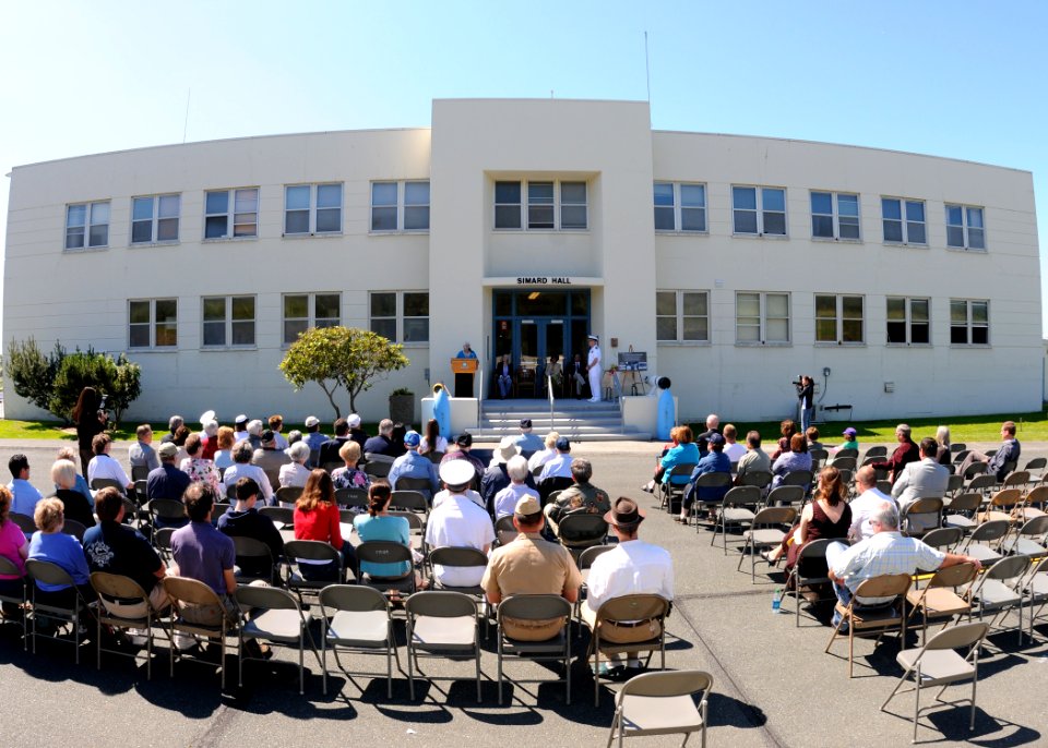 US Navy 100612-N-9860Y-003 Vicki Lucas, granddaughter of Adm. Cyril T. Simard, delivers remarks during a dedication ceremony renaming building 12 to Simard Hall at the Naval Air Station Whidbey Island Seaplane Base