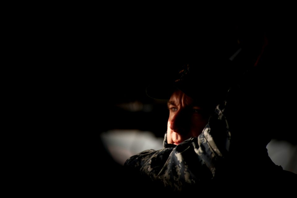 US Navy 100610-N-5319A-274 Cmdr. Jeffrey L. Oakey, commanding officer of the amphibious transport dock ship USS New Orleans (LPD 18), keeps and eye on things