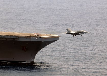 US Navy 100614-N-3885H-046 An F-A-18E Super Hornet launches from USS George H.W. Bush (CVN 77)